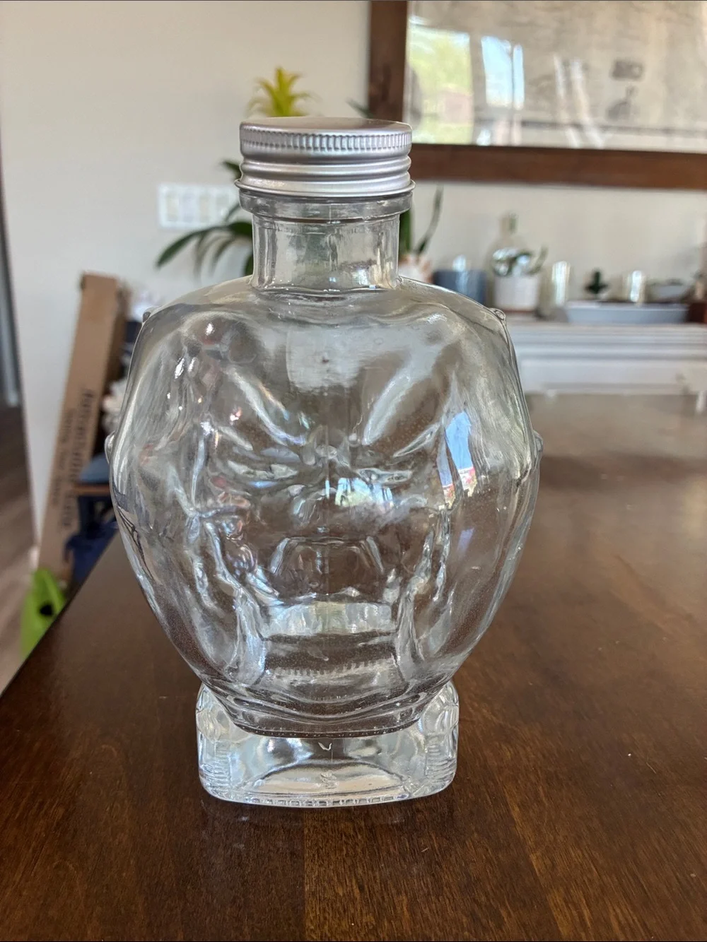 Clear Glass Skull Bottle with Silver Cap